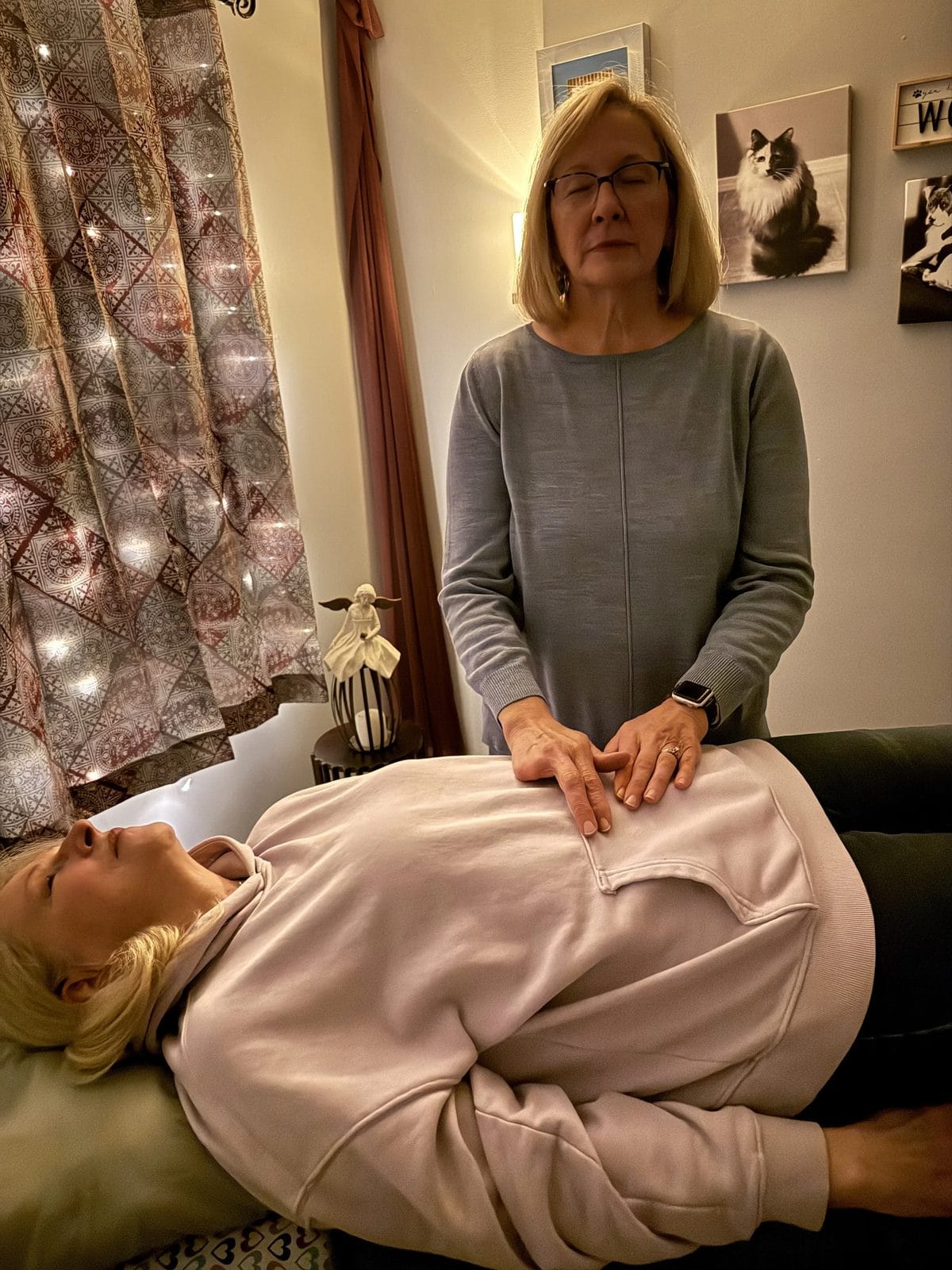 Heather at her Reiki table